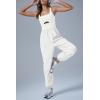 imageCicy Bell Womens Workout Athletic Jumpsuits Activewear Yoga Running Cross Back Long Pants Romper with PocketsWhite
